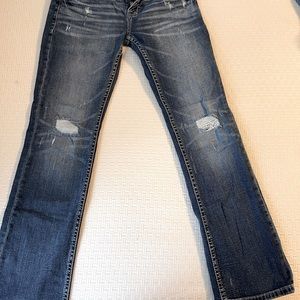 Men’s buckle jeans